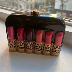 NEW W/TAGS. Never used Timmy Woods Clutch with gold chain.